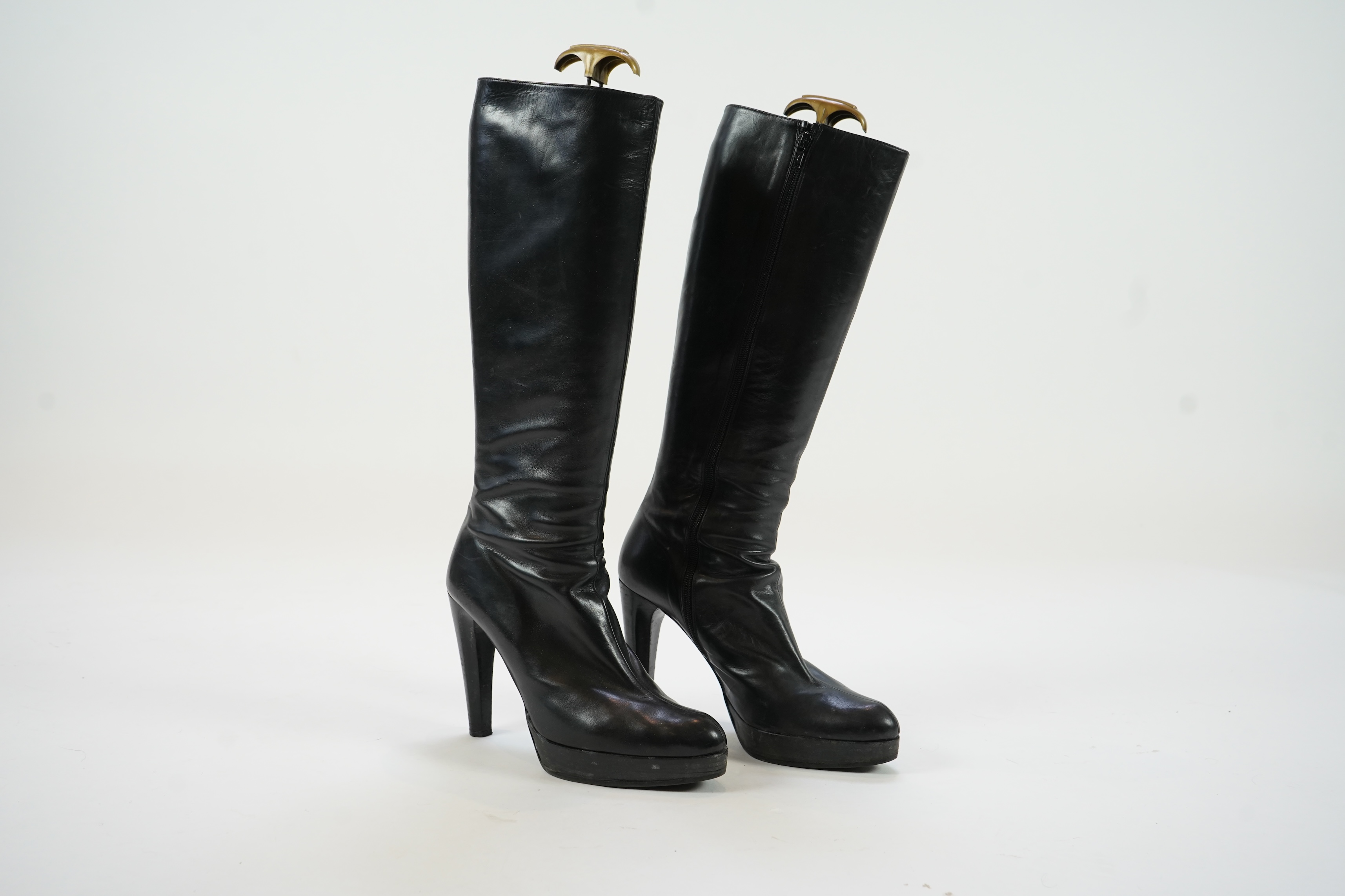 A pair of lady's Prada black leather boots and a pair of Russell & Bromley platform black leather knee high boots. size EU 40 (approx UK size 7.5)